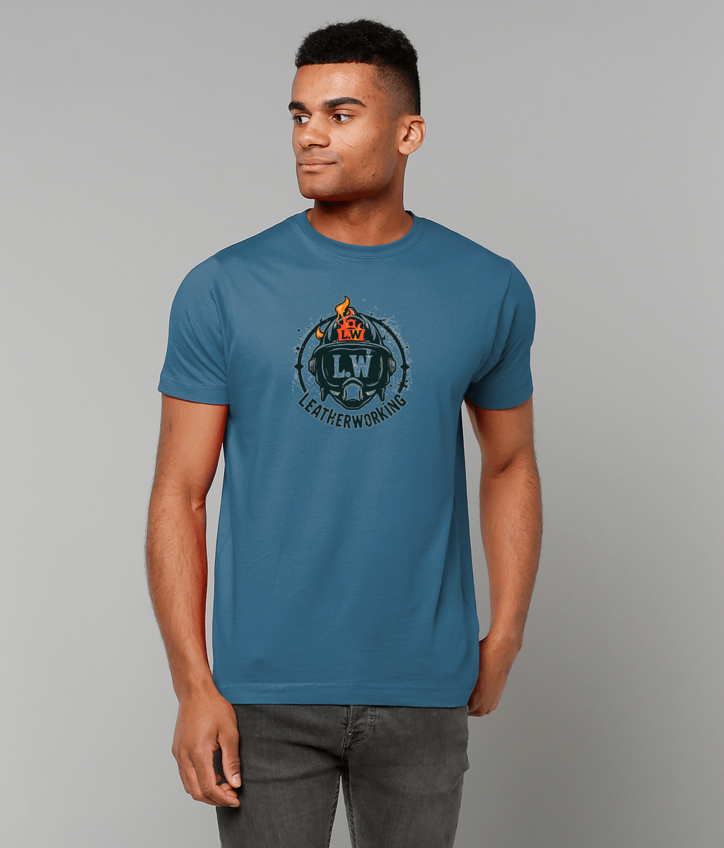 Man wearing a blue t-shirt with a logo on a gray background