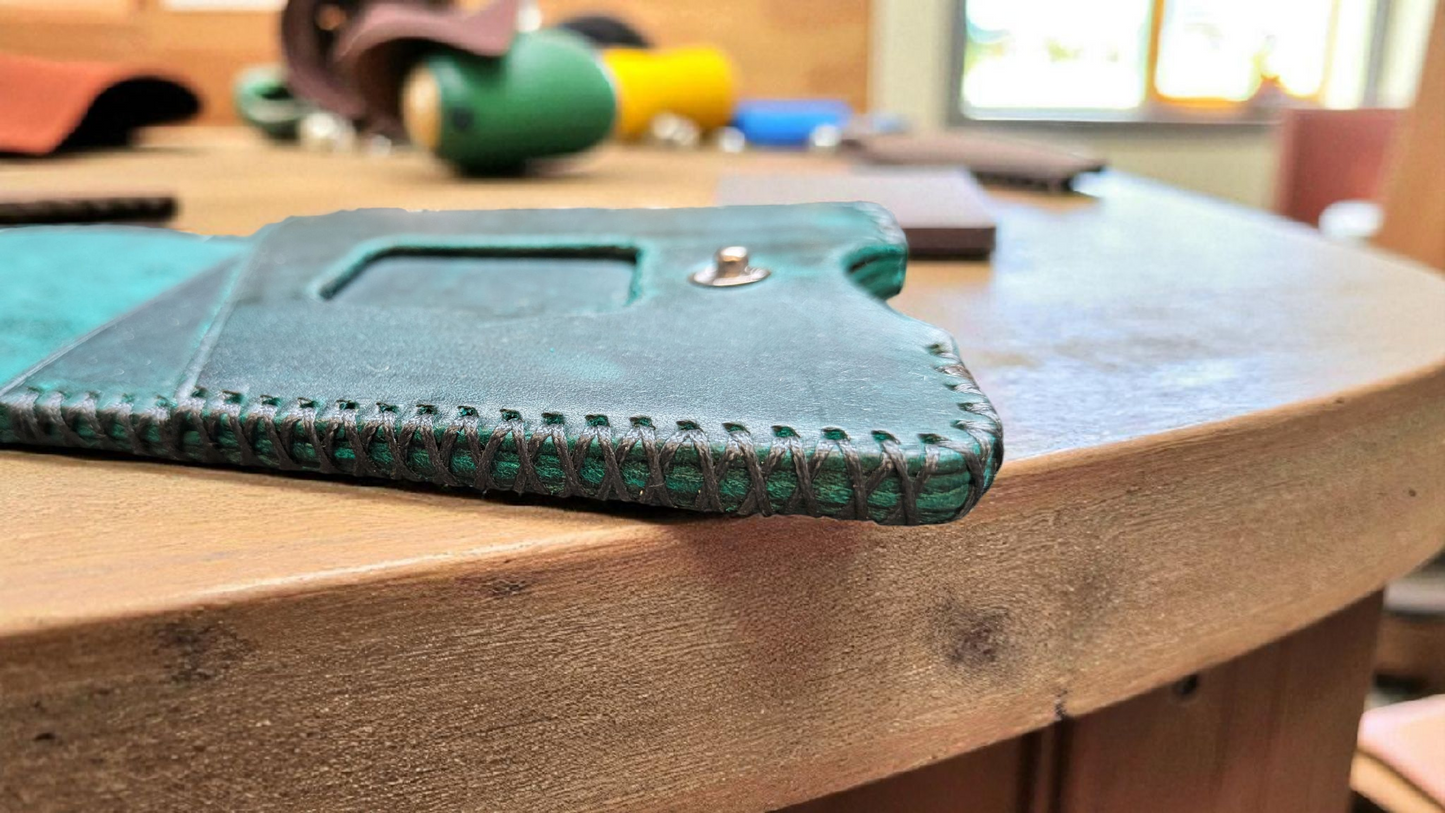 The Godiva Emerald Uragano leather Card Holder Wallet.