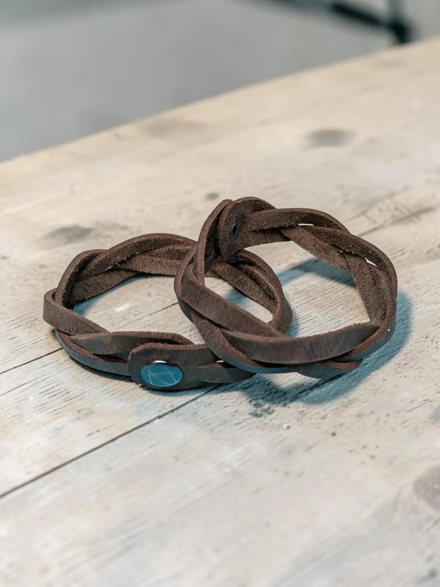 Brown mystery braid leather bracelet with turquoise button closure handmade from full grain leather