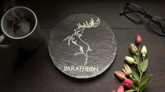 Baratheon House Sigil coaster displayed on a dark wooden tabletop