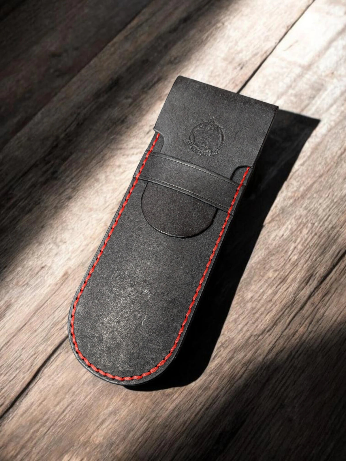 Black Badalassi Pueblo leather pen holder with red hand stitching and embossed LW logo