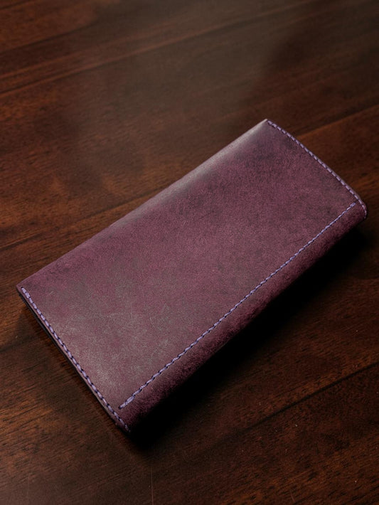 Back of the purple Badalassi Pueblo leather ladies long wallet showing hand stitching