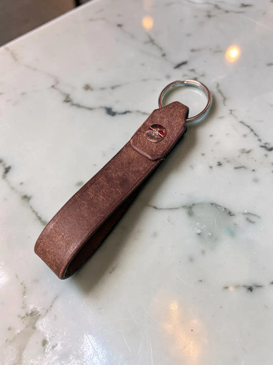 Brown leather badalassi pueblo leather keychain with silver ring and red logo handmade full grain key fob