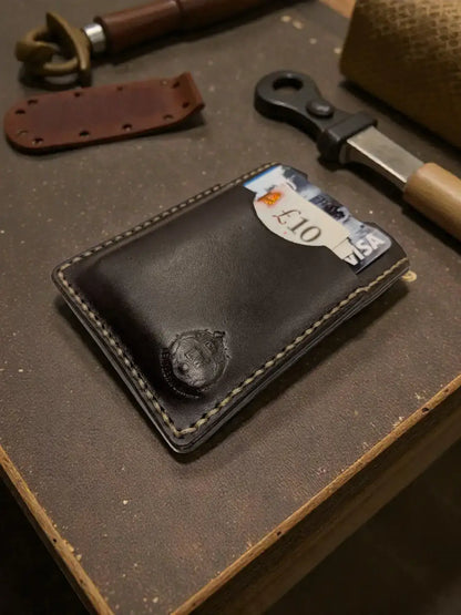 Black leather memphis card holder wallet with white stitching and debossed logo handmade minimalist design