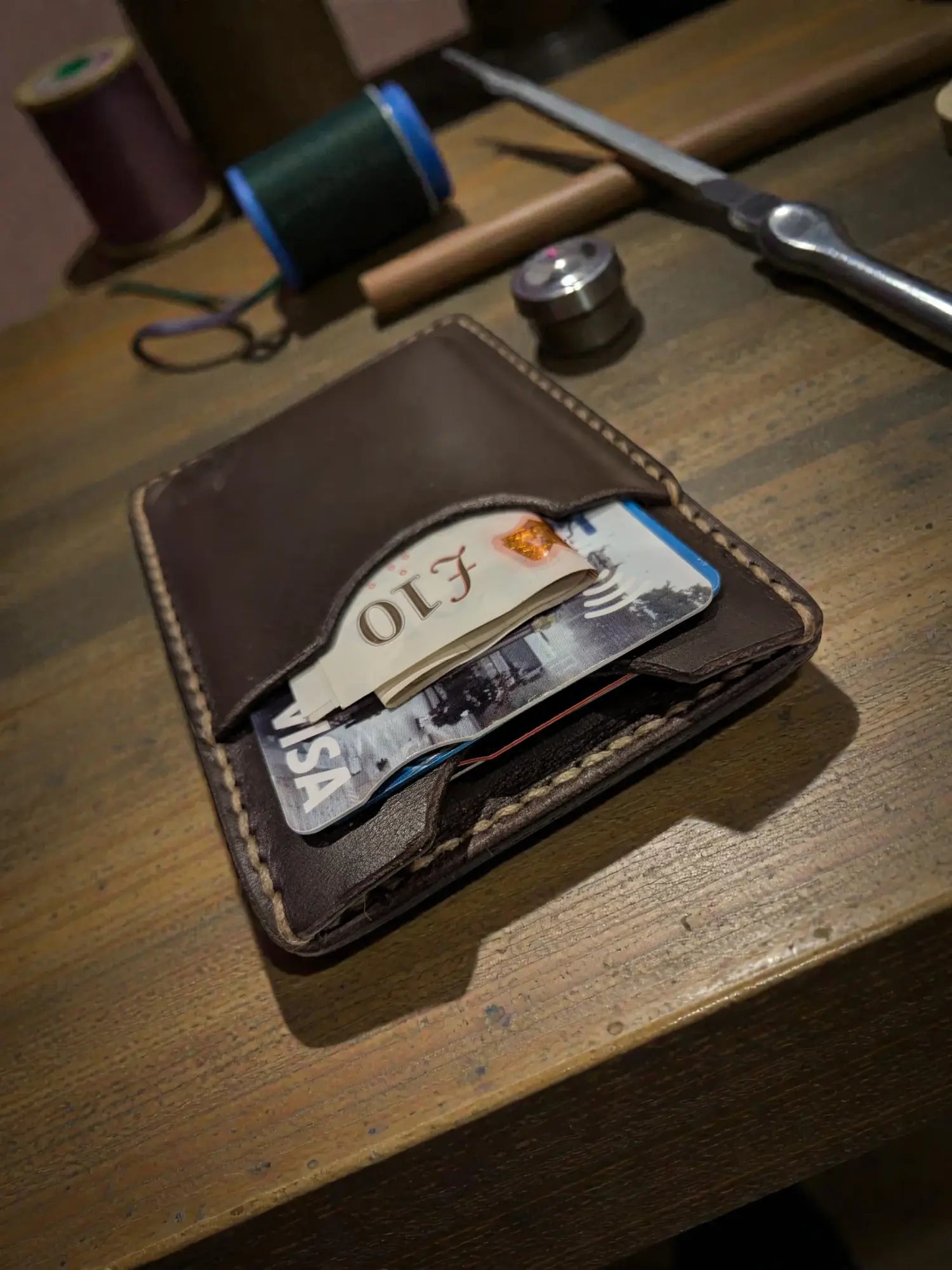 Dark brown memphis card holder wallet handmade minimalist leather with visible stitching and multiple card slots
