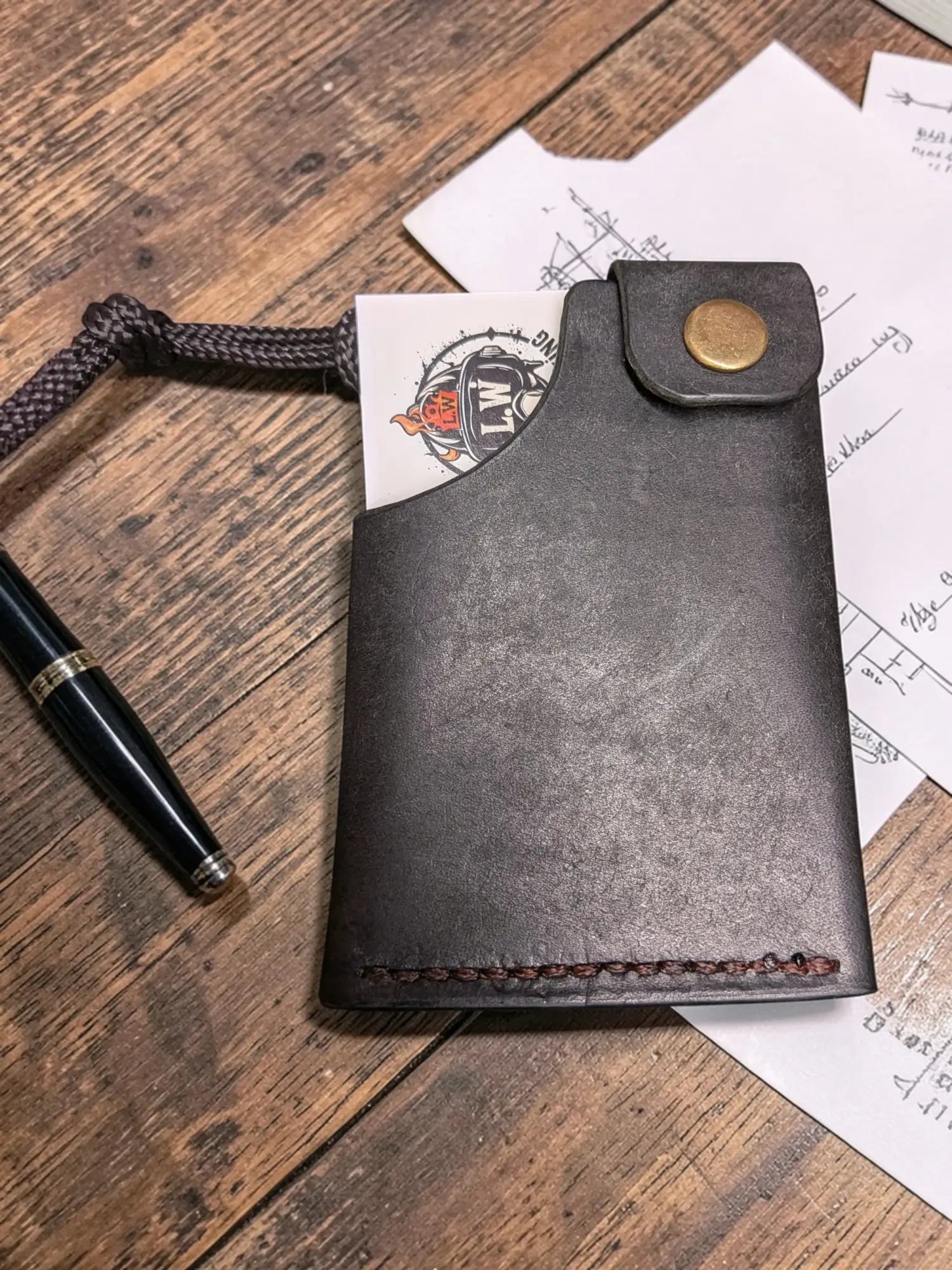 Minerva' Compact Card Holder in Badalassi Pueblo Leather - Handmade Minimalist Wallet in dark brown, crafted from full grain leather with a brass snap button and clean stitching detail.