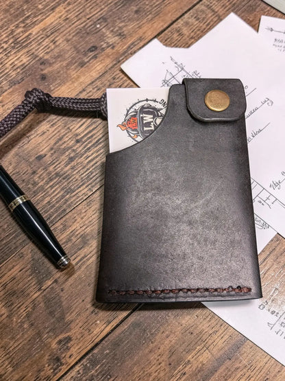 Minerva' Compact Card Holder in Badalassi Pueblo Leather - Handmade Minimalist Wallet in dark brown, crafted from full grain leather with a brass snap button and clean stitching detail.
