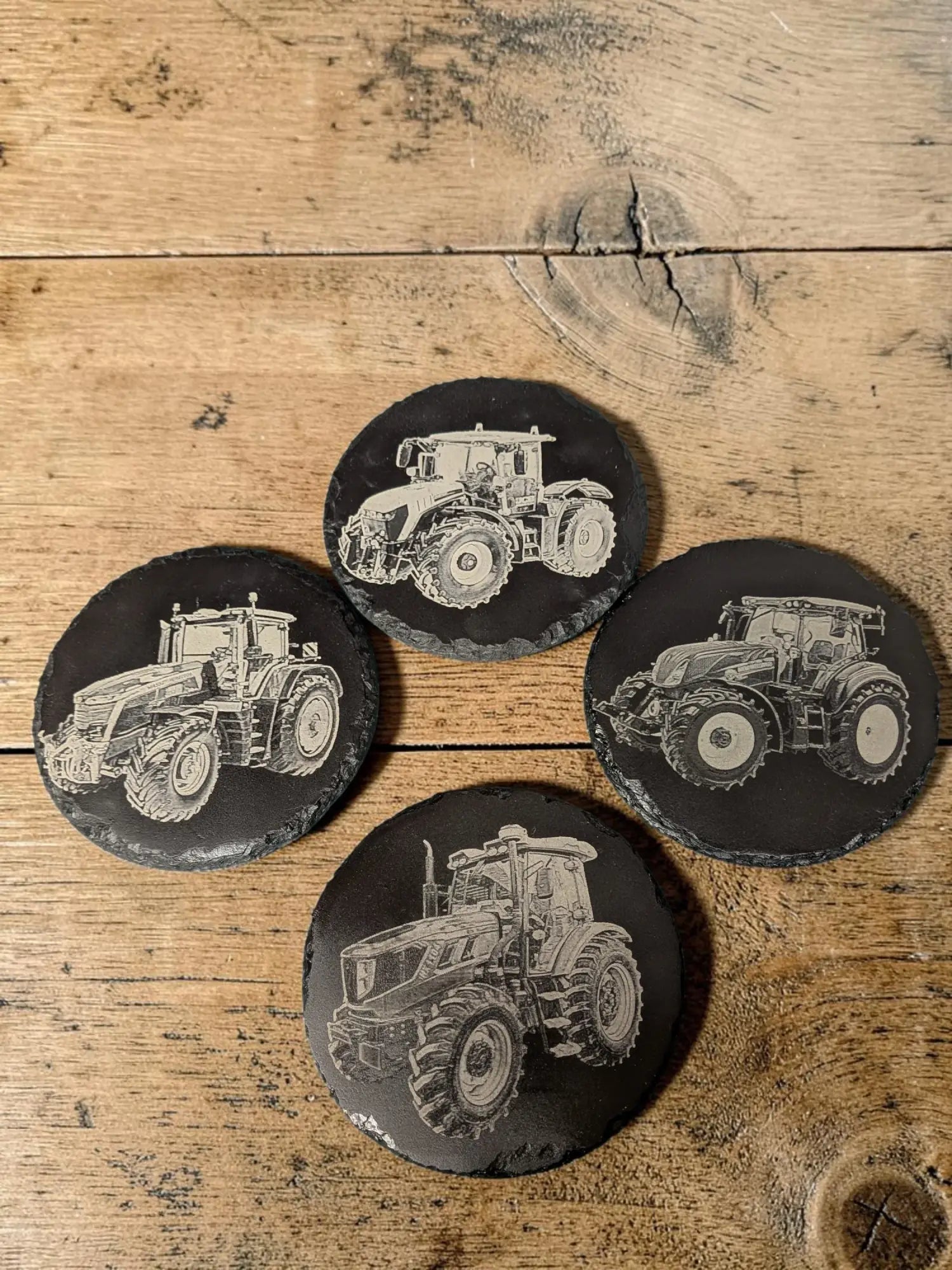 Black slate drinks coasters with engraved white tractor line drawings 100mm circular slate drinks coasters