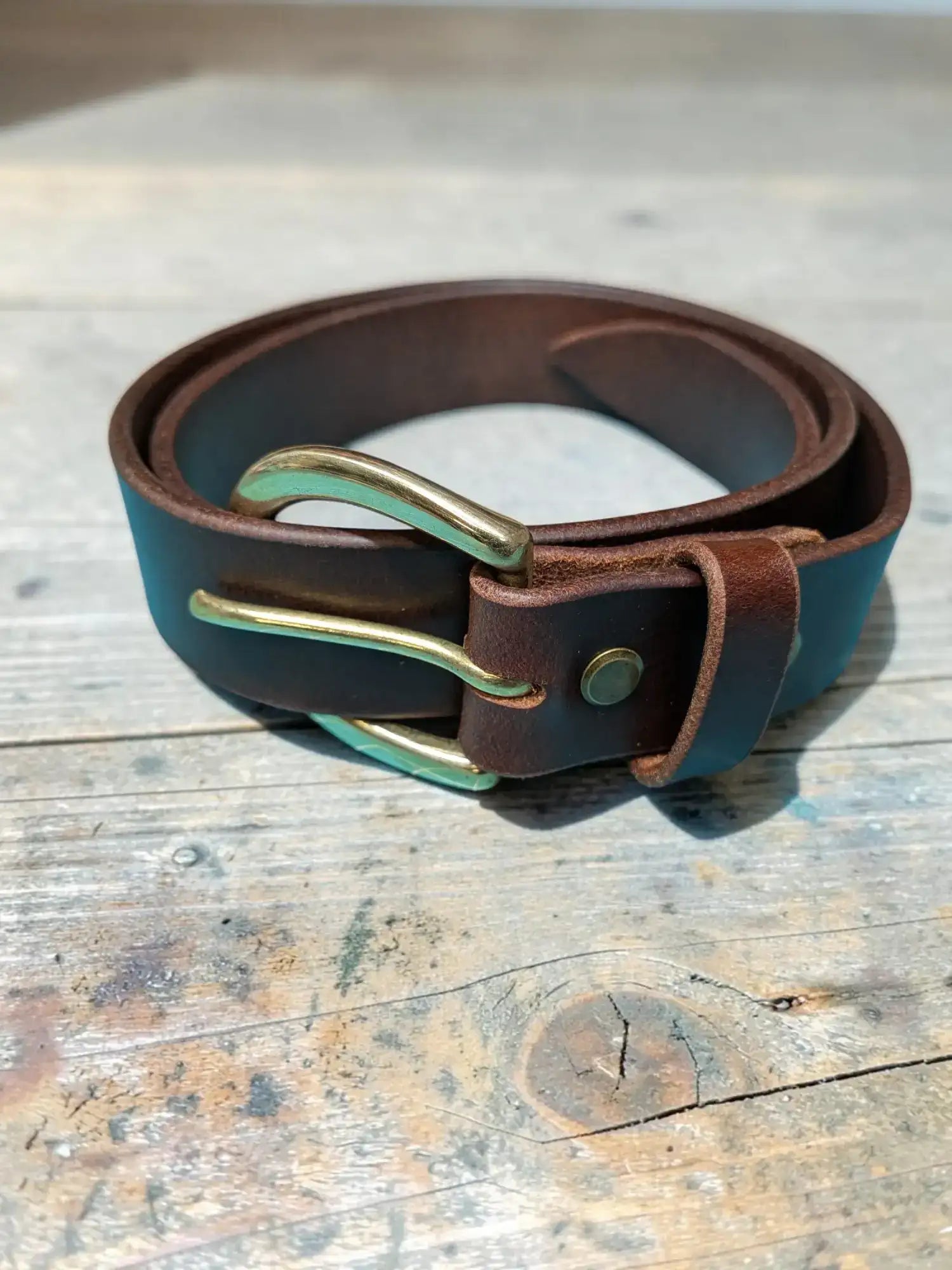 Brown leather belt in oak buffalo hide with brass buckle and matching keeper for women’s full grain leather belt